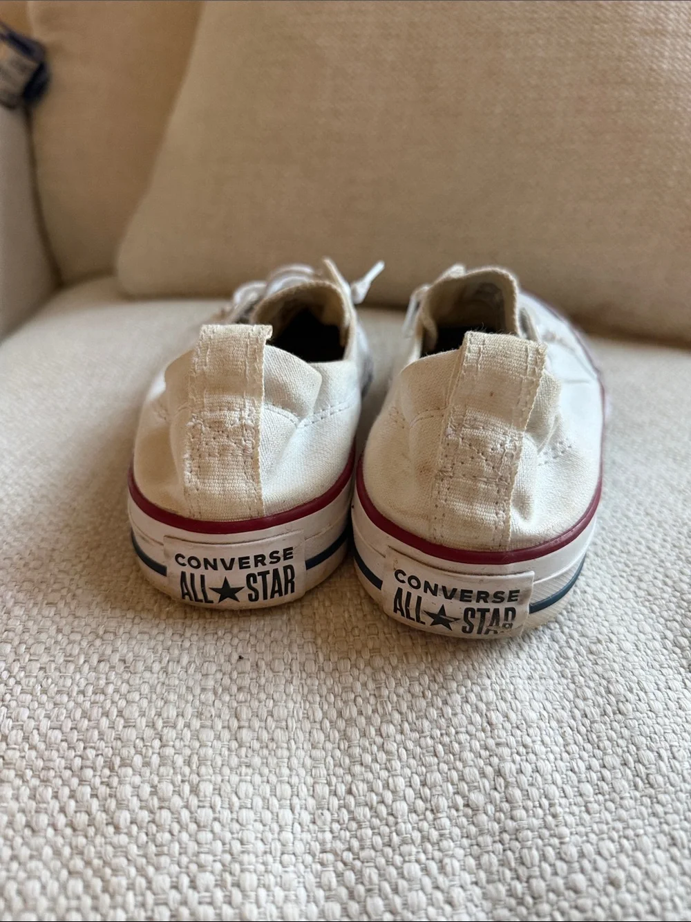 Converse Women’s Low-Top Sneakers in Cream with Red Trim